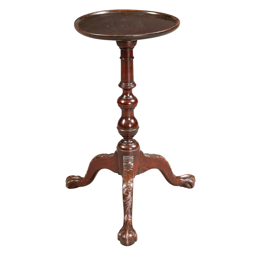 Appraisal: George II Mahogany Candlestand The dished circular top above a