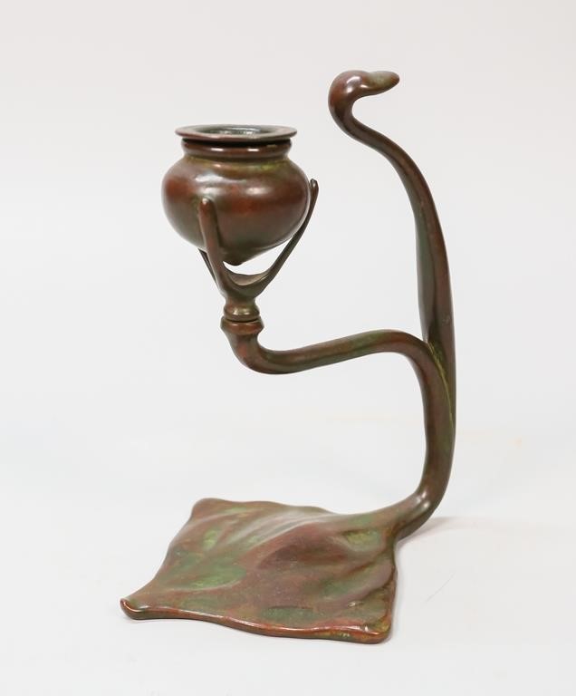 Appraisal: TIFFANY STUDIOS BRONZE COBRA CANDLESTICKTiffany Studios bronze cobra form candlestick