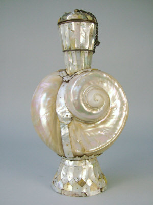 Appraisal: A Persian nautilus shell bottle th century the flared neck