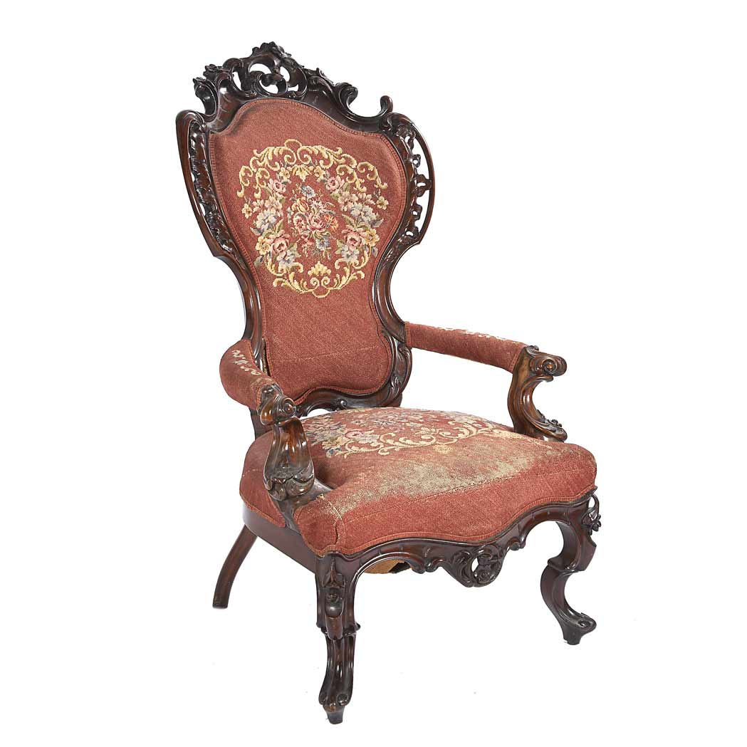 Appraisal: Rococo Revival Carved Mahogany Needlepoint Upholstered Armchair The pierced rocaille