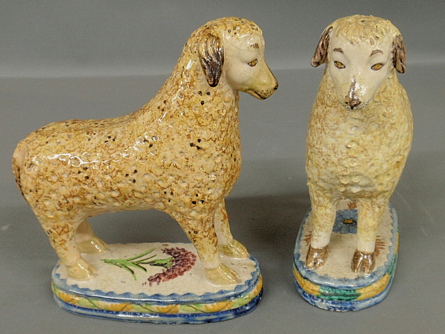 Appraisal: - Pair of faience standing sheep th c with colorful