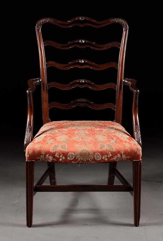 Appraisal: Potthast Brothers Chippendale style carved mahogany upholstered armchair second quarter-