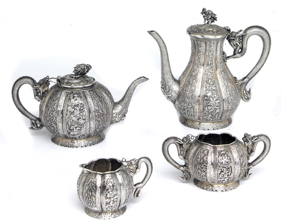 Appraisal: A CHINESE REPOUSS TEA AND COFFEE SERVICE of lobed form