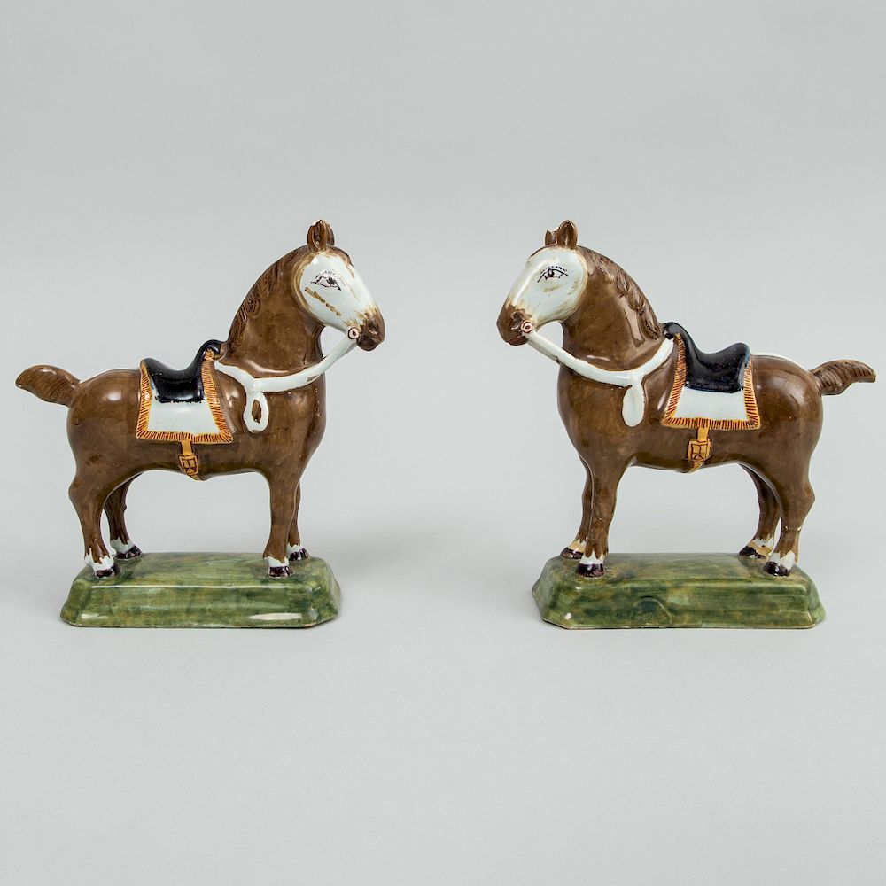 Appraisal: Pair of Dutch Delft Models of Saddled Brown Horses Each