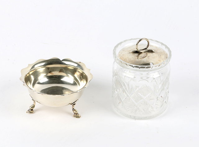 Appraisal: A SMALL SILVER BONBON DISH with shaped edge and standing