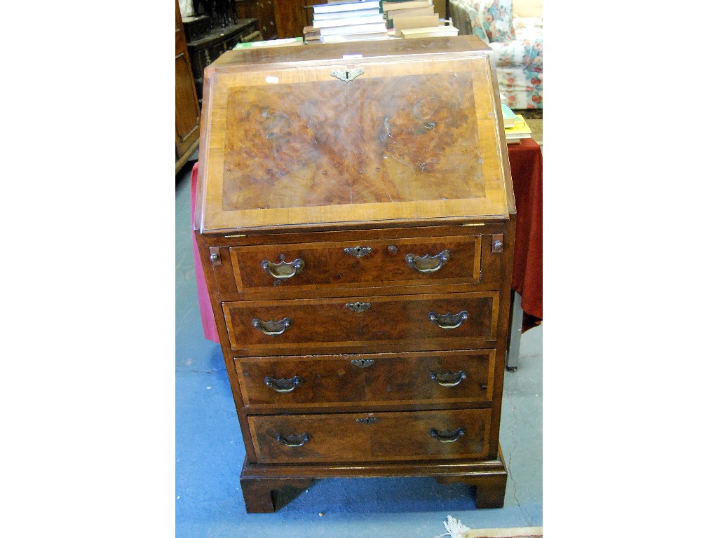 Appraisal: A Georgian style mahogany crossbanded burr walnut fall front bureau