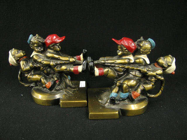 Appraisal: Bronzed Art Deco Figural Bookends Tug-O-War boys at play cold