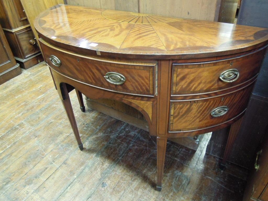 Appraisal: A good quality th century mahogany demi-lune sideboard the top