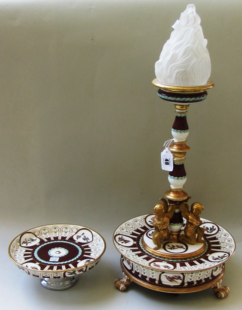 Appraisal: An unusual porcelain table lamp late th century the central