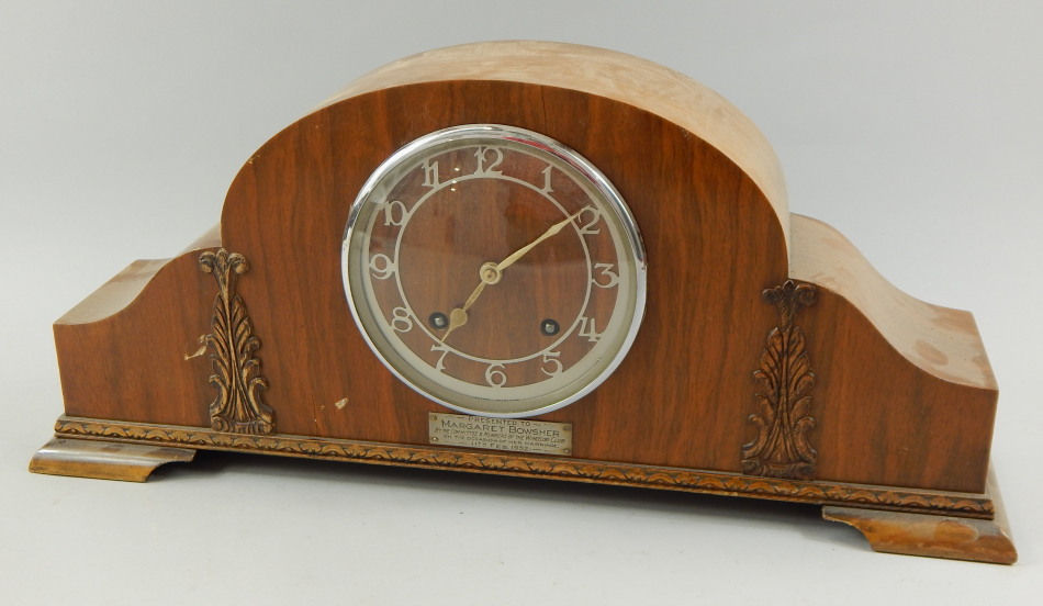 Appraisal: A 's walnut cased mantel clock with silvered dial bearing