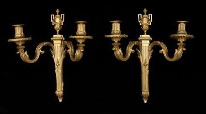 Appraisal: PAIR OF LOUIS XVI-STYLE GILT-BRONZE TWO-LIGHT WALL APPLIQUES Impressed Baques