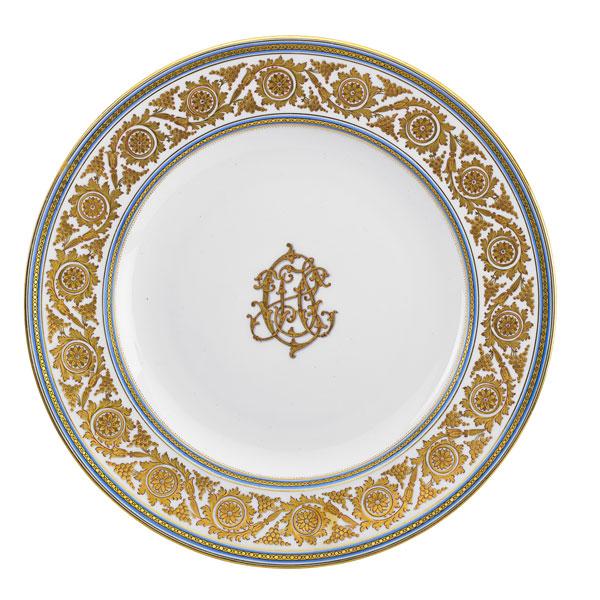 Appraisal: AUSTRIAN PORCELAIN PLATES Set of eighteen gilded center monogram elaborate