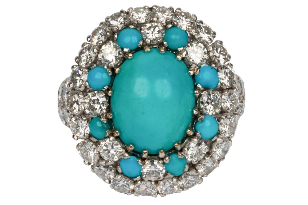 Appraisal: KARAT WHITE GOLD TURQUOISE DIAMOND RINGcentering one oval cabochon cut