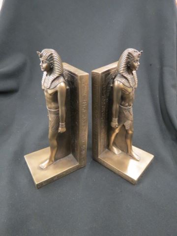 Appraisal: Pair of Art Deco Bronze Egyptian Bookends classical figures and