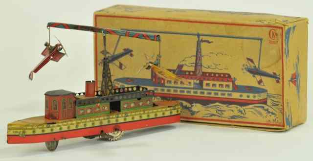 Appraisal: LINER WITH CIRCLING AIRPLANES Kellermann Germany lithographed tin boat with