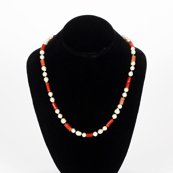 Appraisal: Red coral and freshwater pearl necklace strand Clasp marked k