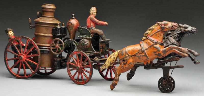 Appraisal: Cast Iron Fire Pumper Horse-Drawn Toy Description American Made by