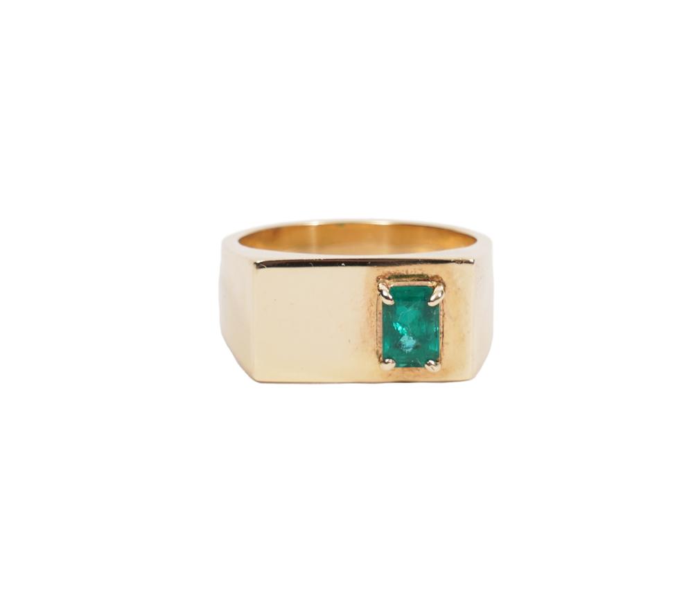 Appraisal: K YG EMERALD CONTEMPORARY UNISEX RING K yellow gold and