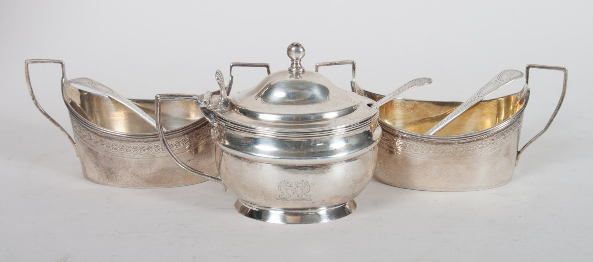 Appraisal: Two Georgian sterling salt cellars a mustard pot the salt