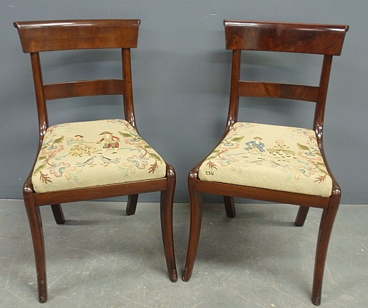 Appraisal: - Pair of saber leg mahogany side chairs early th