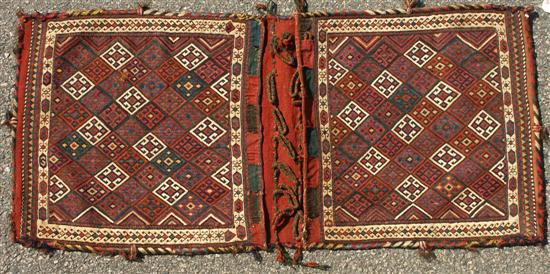 Appraisal: PAIR KURDISH REVERSE SOUMAC CARGO BAGS Persia circa feet x