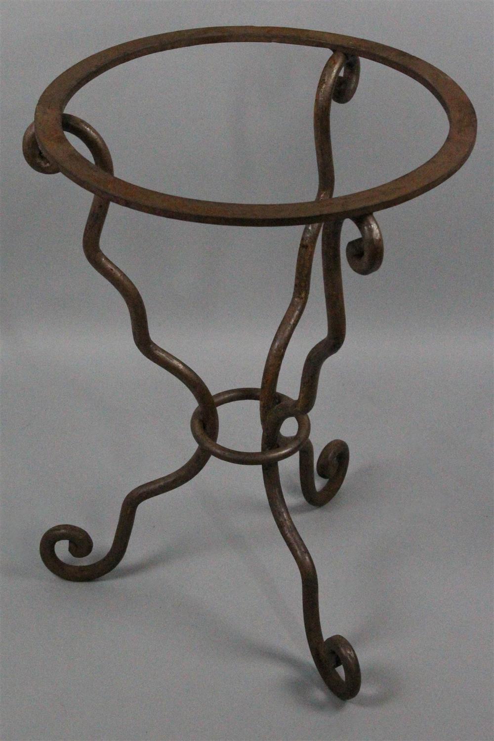 Appraisal: CAST IRON GARDEN TABLE BASE fanciful design with three legs