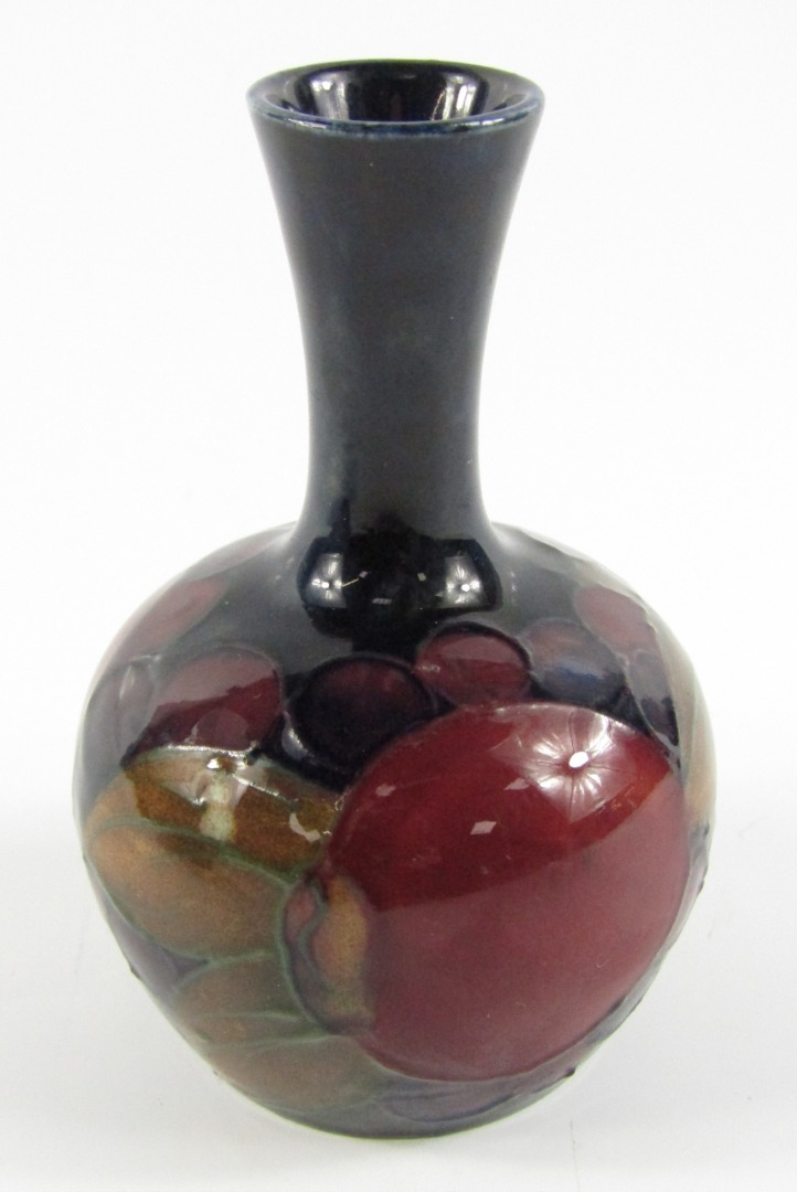 Appraisal: A Moorcroft pottery vase decorated in the Pomegranate pattern of