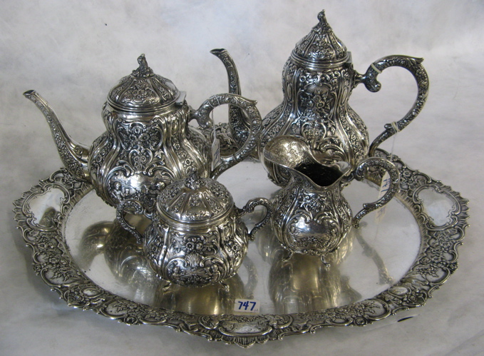 Appraisal: GERMAN FINE SILVER TEA COFFEE SERVICE piece set heavily chased