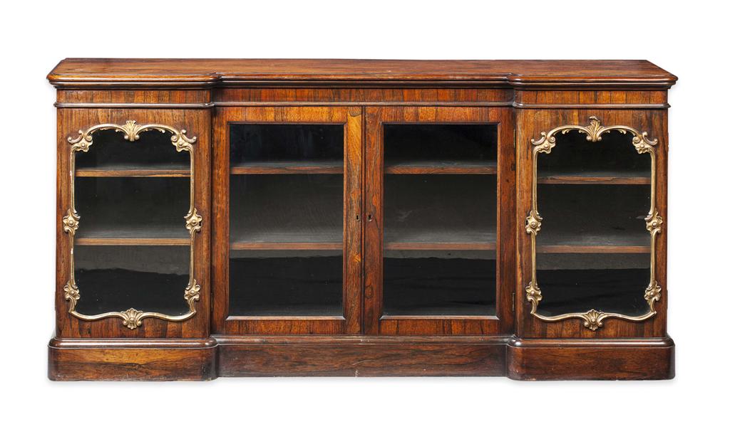 Appraisal: GEORGE IV ROSEWOOD AND PARCEL GILT LOW BOOKCASE CIRCA the