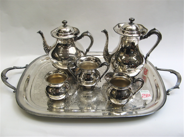 Appraisal: FIVE PIECE TEA AND COFFEE PLATED SERVICE and a serving