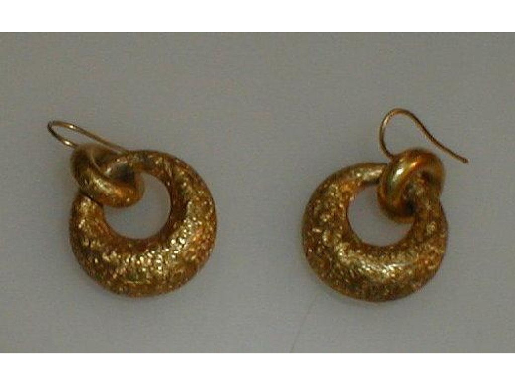 Appraisal: A pair of hollow Victorian hoop earrings on French ear