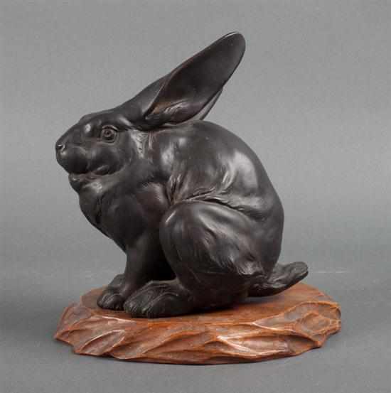 Appraisal: Chinese School Bronze figure of a rabbit dark brown patina