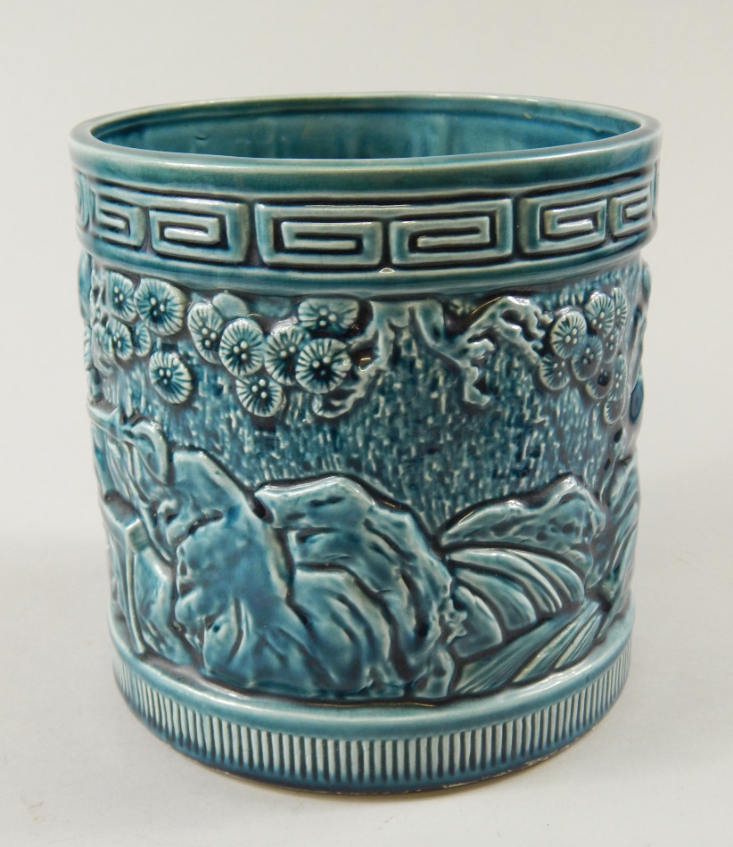 Appraisal: An early thC Bretby jardiniere with turquoise glaze and moulded