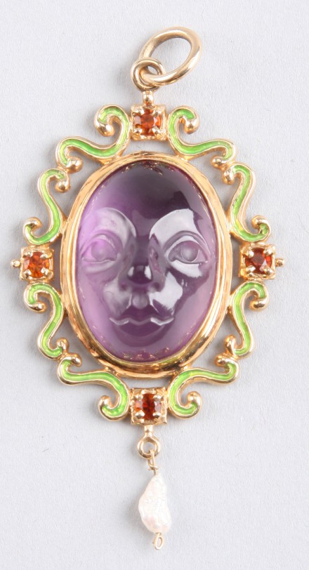 Appraisal: K amethyst garnet and pearl pendant x amethyst face pendant