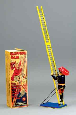 Appraisal: MARX ''SLIPPING SAM CLIMBING FIREMAN Boxed example lithographed tin figures