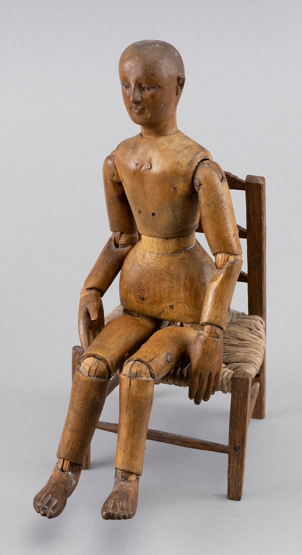 Appraisal: ARTIST'S WOODEN MANNEQUIN LATE TH CENTURY MANNEQUIN HEIGHT CHAIR HEIGHT