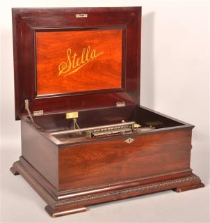 Appraisal: Stella Swiss Made Mahogany - Disc Player Accompanied with discs