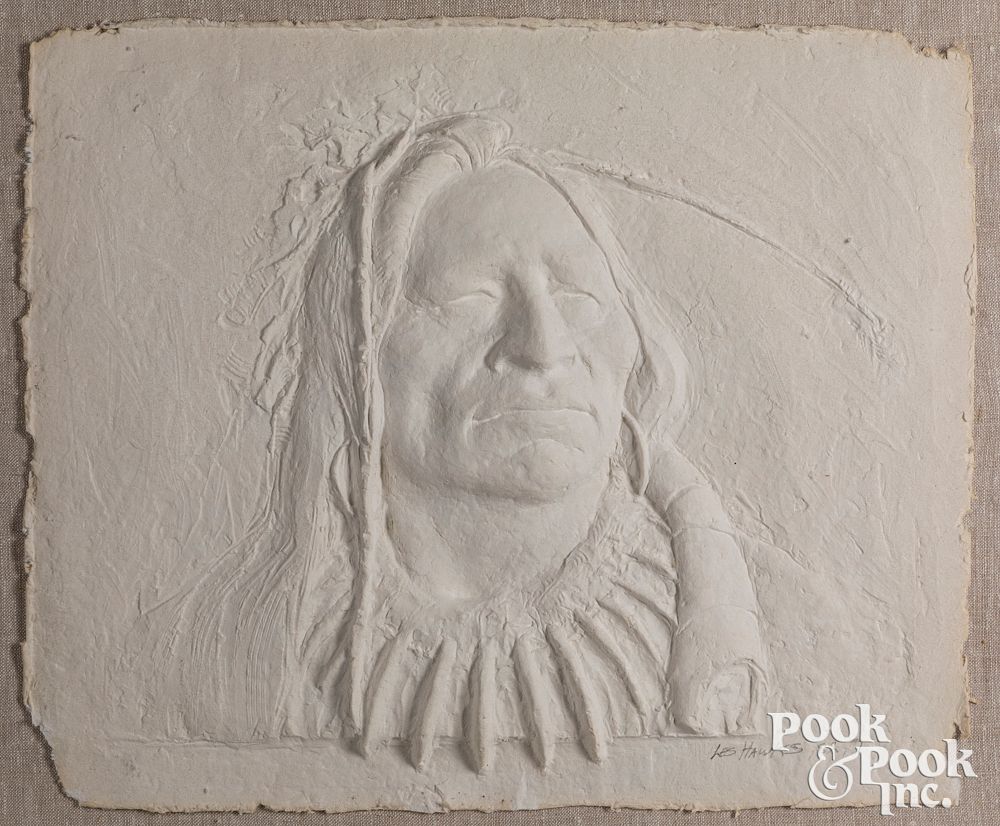 Appraisal: Les Hawks molded paper depiction of a Indian Chief Les