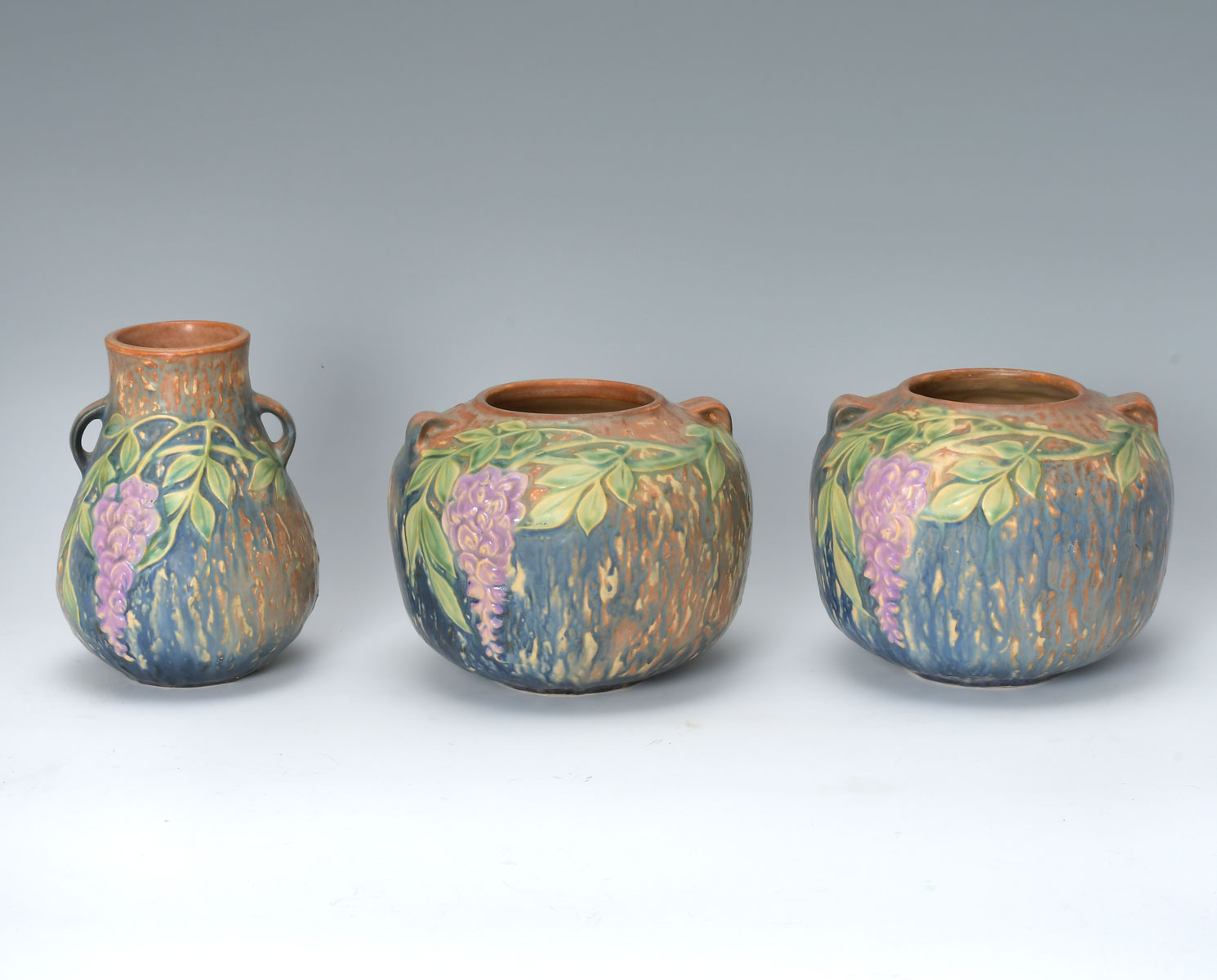 Appraisal: PC ROSEVILLE POTTERY ''WISTERIA'' VASES Comprising - handled vases of