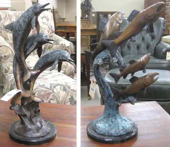 Appraisal: TWO MARINE BRONZE SCULPTURES dolphin group and salmon group each