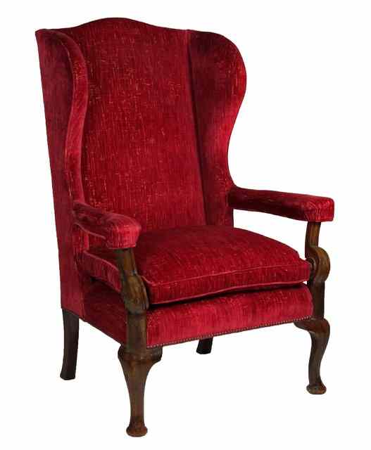 Appraisal: A Louis XIV style walnut wing armchair with scroll arm