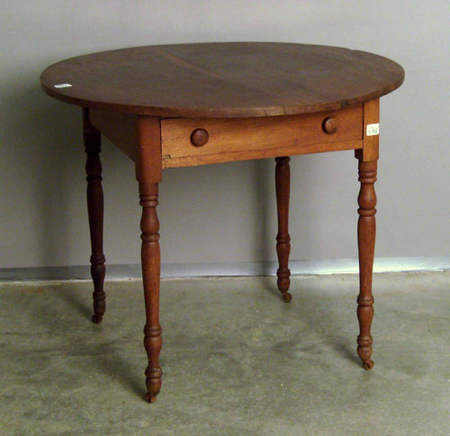 Appraisal: Pennsylvania walnut tavern table th c h w