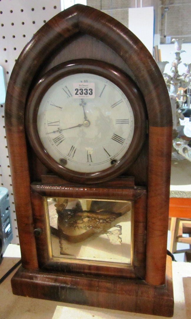 Appraisal: A rosewood cased arch top mantel clock