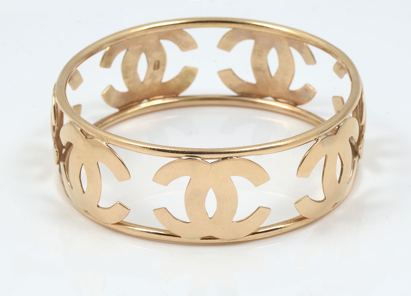 Appraisal: K CHANEL INSPIRED CUSTOM BANGLE BRACELET K yellow gold bracelet