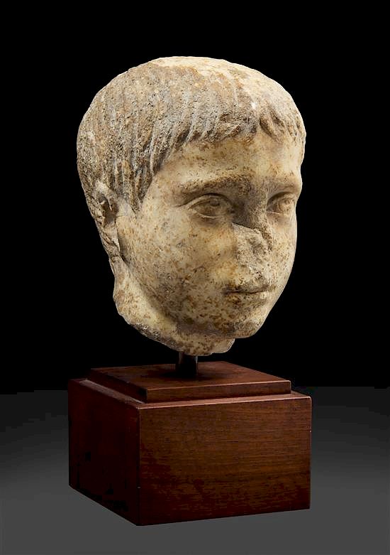 Appraisal: A Roman Marble Head of a Youth Height inches A