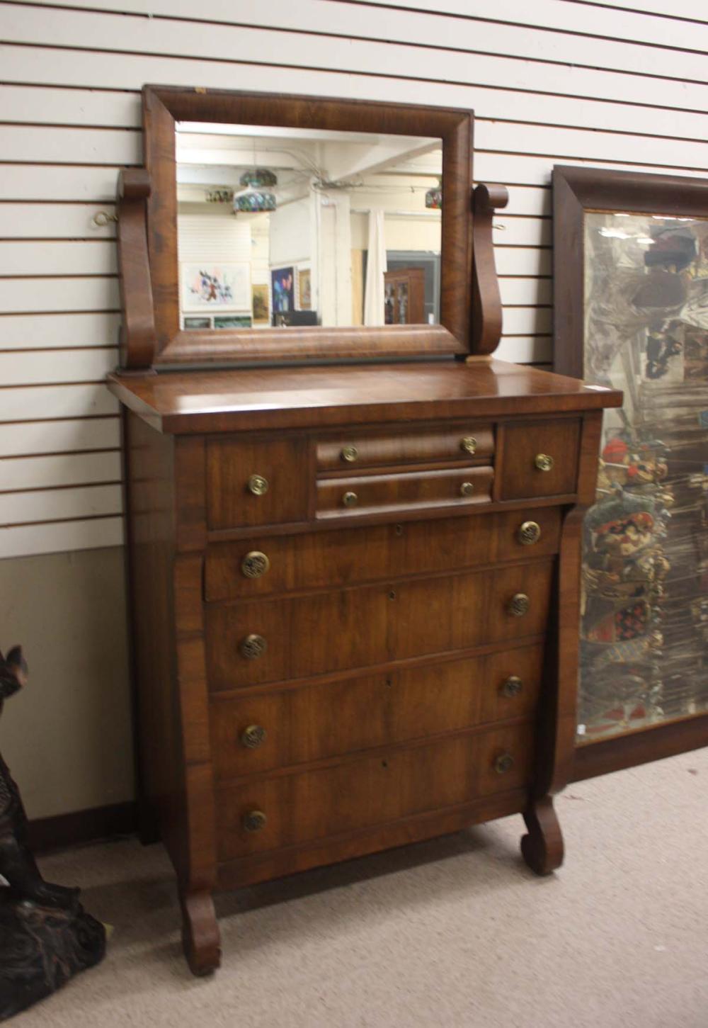 Appraisal: WALNUT EMPIRE REVIVAL DRESSER American c a tall chest of