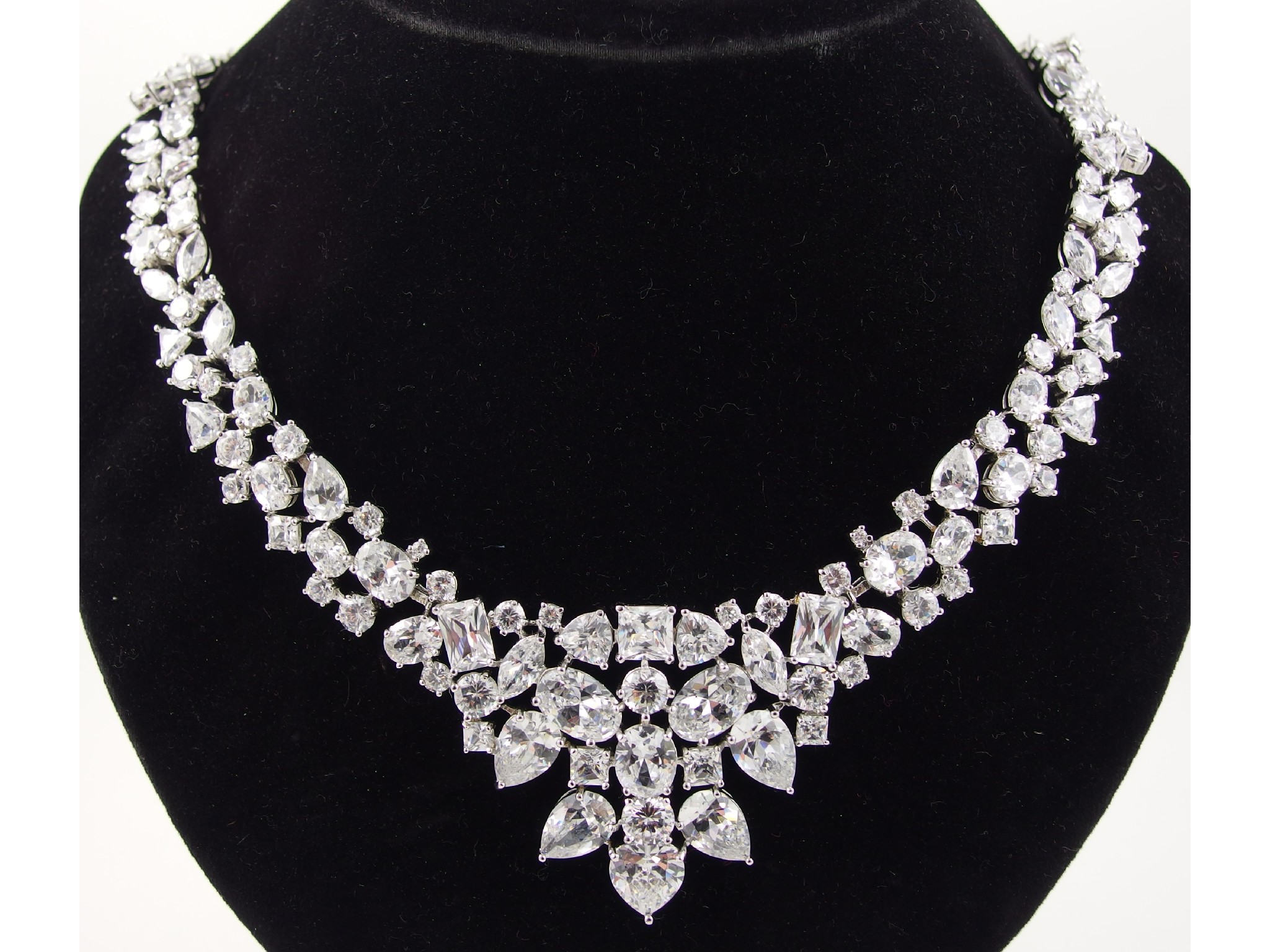 Appraisal: A silver clear gem stone set statement necklace