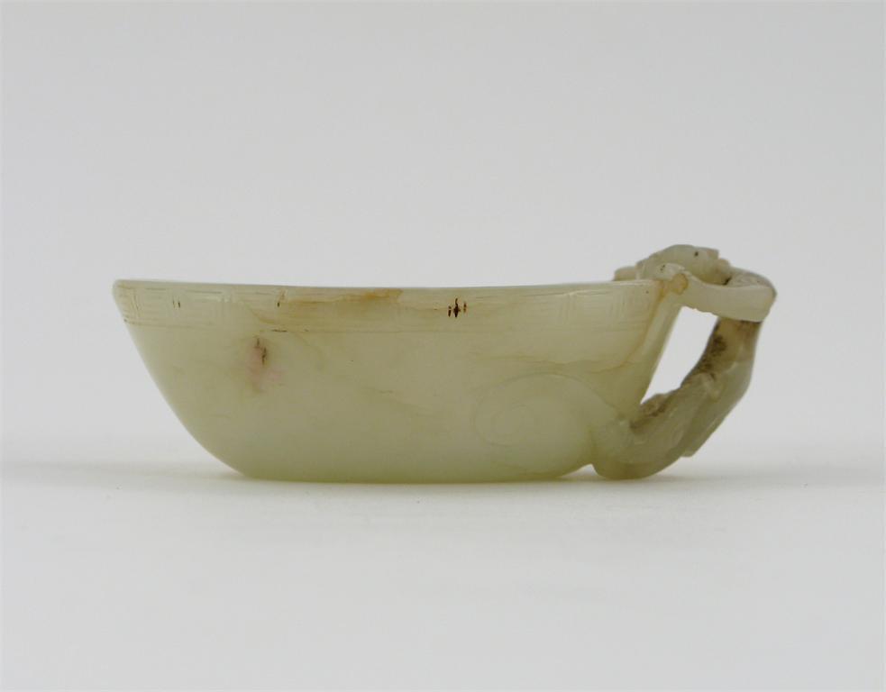 Appraisal: A small Chinese pale celadon jade oval cup