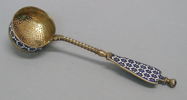 Appraisal: Blue and white enameled handle and band on ladle l