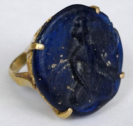 Appraisal: ISLAMIC GLASS GEM SET IN A GOLD RING Approx size